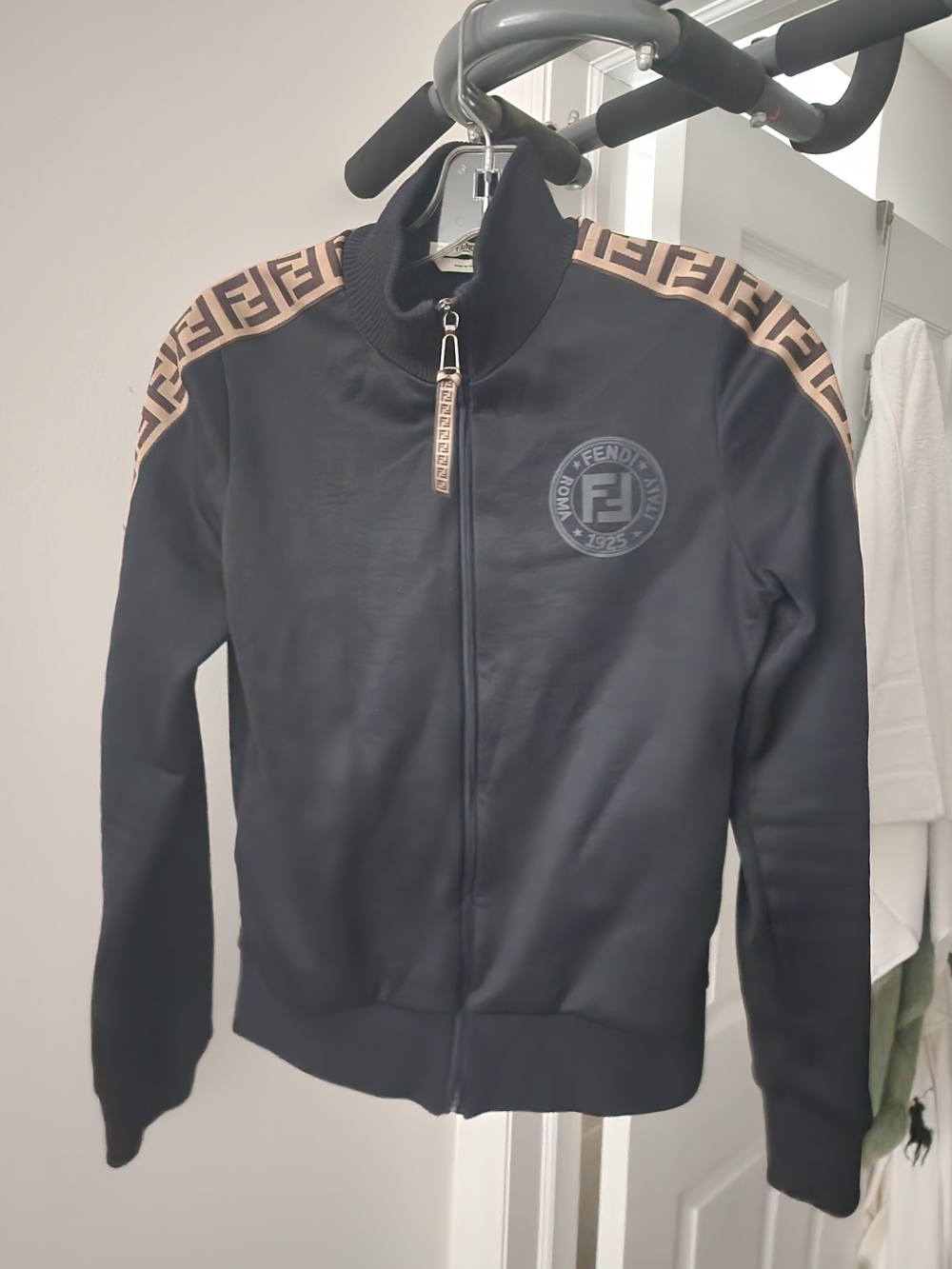 Authentic Fendi Black Bomber Jacket with Brown FF Shoulder Accents. IT 38